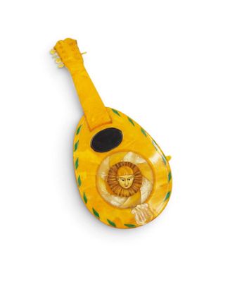 an image of a yellow guitar with a lion on it ' s neck
