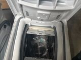 a washing machine that is sitting on the floor