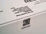 a close up of a box with a qr code on it