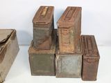 five old boxes stacked on top of each other