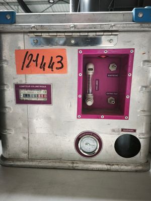 a machine that has a clock on the side of it