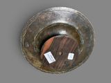 an image of a metal bowl with a label on it