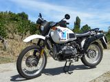 a motorcycle that is parked on the side of the road