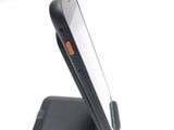 a close up of a cell phone on a cell phone stand