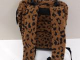brown and black leopard print backpack with black handle