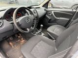 dashboard of a car with a steering wheel and dashboard controls