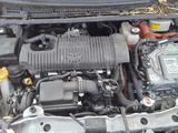 a picture of a car engine with its hood open