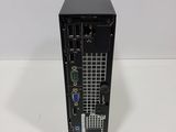 a close up of a computer tower with a keyboard and mouse