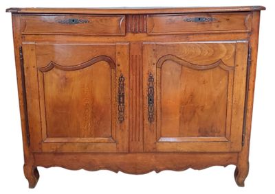 a wooden cabinet with two doors and a drawer underneath it