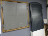 a large mirror hanging on the wall in a room