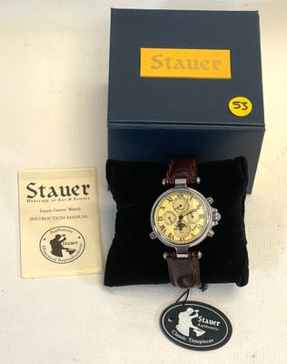 a watch that is sitting in a box on a table