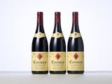 three bottles of wine sitting on top of a table