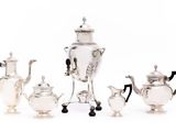 an image of a group of silver plated tea and coffee pots