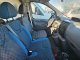 a blue seat cover in the back of a car