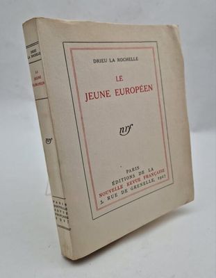 the book is open on a white surface with a red border