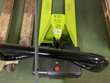 two different views of a fork lifter in a warehouse