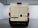 a white van that is parked in a garage
