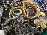 many different types of jewelry on the table