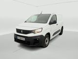 a white van is parked in a white room