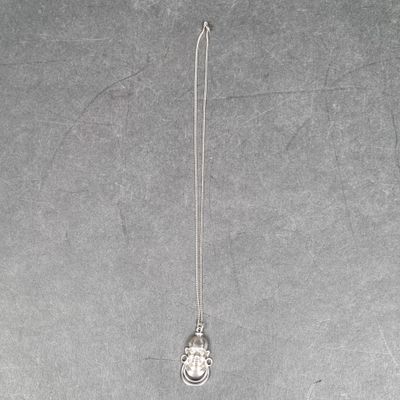 Collier et pendentif en argent, à décor d'un africain (poids…