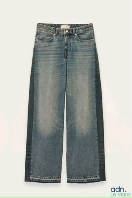 the jeans are blue and have a black stripe on the side