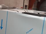a box that has a computer on top of it