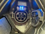 a close up view of a car ' s electronic charging system