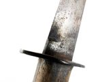 a close up of a knife with a blade on it