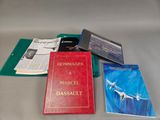 three books are sitting on a table next to each other