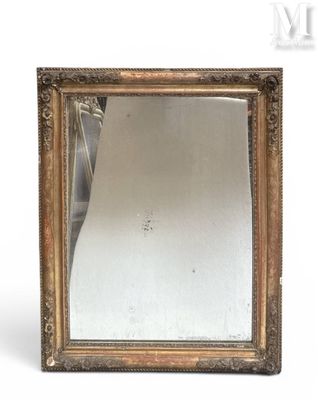 an antique gold framed mirror on a white background