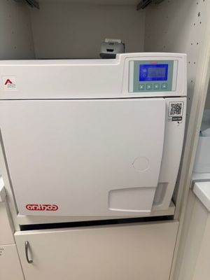 an image of a white machine in a room