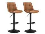une paire de tabourets de bar en cuir marron sur fond blanc