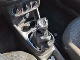 a close up of a car ' s gear lever and gear shift