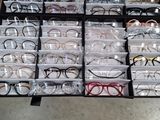 a lot of glasses that are sitting in a box