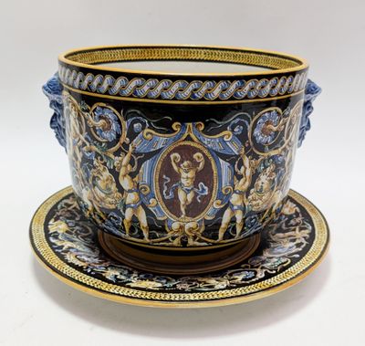 a cup and saucer on a saucer on a white table