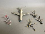 several toy airplanes are scattered on the floor next to each other