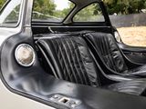 an image of a black and white car with leather seats