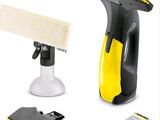 the yellow and black cleaning kit includes a sponge, a cleaning cloth, and a sponge