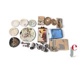 many different types of plates and bowls on the table