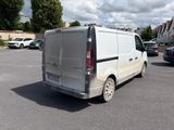 a white van that is parked in a parking lot
