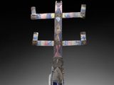 an image of a sculpture of a cross made out of metal