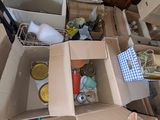 many boxes that are full of stuff in the room