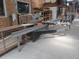 a picture of a room with a table and a sawhorse