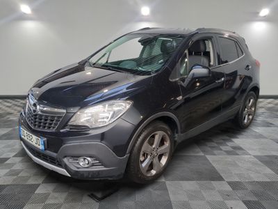 a picture of a black car parked in a garage