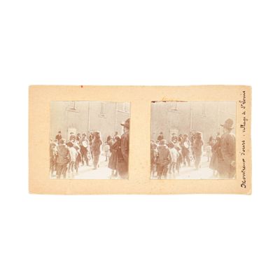 two old photos of a group of people on the street