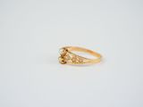 an image of a gold ring on a white background