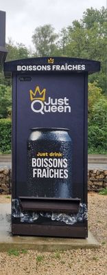 a sign that says just queen with a crown on it
