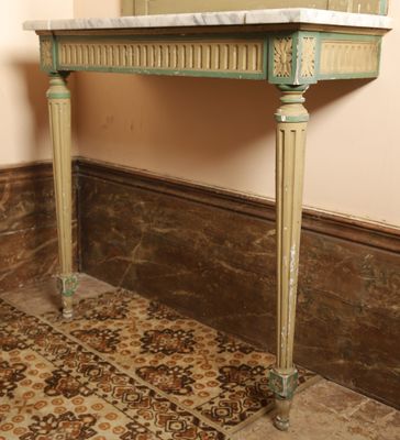 a marble top table with a mirror on top of it