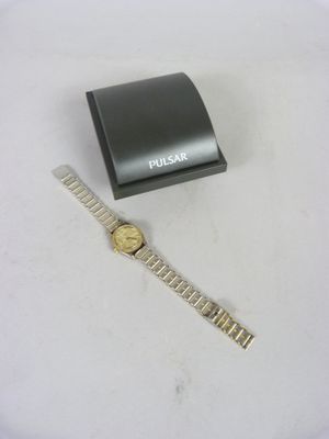 * EDMA - Montre de dame acier et métal doré.