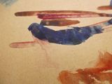 a watercolor painting of a fish and a bird on a piece of paper